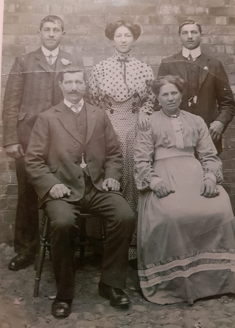 Black and white photo of a family portrait.